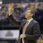 Phoenix Suns head coach Jeff Hornacek calls a play for his team as they played the Indiana Pacers during the first half of an NBA basketball game in Indianapolis, Tuesday, Jan. 12, 2016. (AP Photo/Michael Conroy)