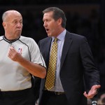 Phoenix Suns head coach Jeff Hornacek, right, talks with referee David Jones during the first half of an NBA basketball game against the Los Angeles Lakers, Sunday, Jan. 3, 2016, in Los Angeles. (AP Photo/Mark J. Terrill)