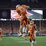 Clemson's Hunter Renfrow celebrates his touchdown catch during the first half of the NCAA college football playoff championship game against Alabama Monday, Jan. 11, 2016, in Glendale, Ariz. (AP Photo/David J. Phillip)