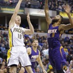 Indiana Pacers forward Chase Budinger (10) shoots over Phoenix Suns forward Markieff Morris (11) during the first half of an NBA basketball game in Indianapolis, Tuesday, Jan. 12, 2016. (AP Photo/Michael Conroy)