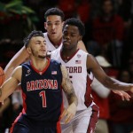 Arizona guard Gabe York (1) dribbles next to Stanford guard Marcus Allen during the second half of an NCAA college basketball game Thursday, Jan. 21, 2016, in Stanford, Calif. Arizona won 71-57. (AP Photo/Marcio Jose Sanchez)