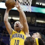 Indiana Pacers' Chase Budinger (10) goes up for a shot against Phoenix Suns' Alex Len, top right, of Ukraine, during the first half of an NBA basketball game, Tuesday, Jan. 19, 2016, in Phoenix. (AP Photo/Ross D. Franklin)