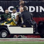 Green Bay Packers wide receiver Randall Cobb (18) is carted off the field after being injured against the Arizona Cardinals during the first half of an NFL divisional playoff football game, Saturday, Jan. 16, 2016, in Glendale, Ariz. (AP Photo/Ross D. Franklin)