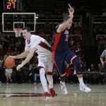 Stanford forward Rosco Allen, left, dribbles next to Arizona forward Ryan Anderson during the second half of an NCAA college basketball game Thursday, Jan. 21, 2016, in Stanford, Calif. Arizona won 71-57. (AP Photo/Marcio Jose Sanchez)