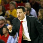 Arizona head coach Sean Miller calls instructions from the bench during the first half of an NCAA college basketball game against Arizona State, Sunday, Jan. 3, 2016, in Tempe, Ariz. (AP Photo/Ralph Freso)