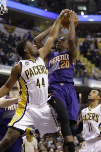 Indiana Pacers forward Solomon Hill (44) blocks the shot of Phoenix Suns guard Archie Goodwin (20) during the second half of an NBA basketball game in Indianapolis, Tuesday, Jan. 12, 2016. The Pacers defeated the Suns 116-97. (AP Photo/Michael Conroy)