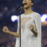 Ciara sings the national anthem before the NCAA college football playoff championship game between Clemson and Alabama Monday, Jan. 11, 2016, in Glendale, Ariz. (AP Photo/David J. Phillip)