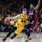 Arizona State's Kodi Justice (44) drives to the basket past the defense of Arizona's Justin Simon during the first half of an NCAA college basketball game, Sunday, Jan. 3, 2016, in Tempe, Ariz. (AP Photo/Ralph Freso)