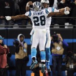 Carolina Panthers' Jonathan Stewart and Cam Newton celebrate a touchdown during the first half the NFL football NFC Championship game against the Arizona Cardinals, Sunday, Jan. 24, 2016, in Charlotte, N.C. (AP Photo/Mike McCarn)