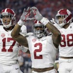 Alabama's Derrick Henry reacts after a touchdown run during the first half of the NCAA college football playoff championship game against Clemson Monday, Jan. 11, 2016, in Glendale, Ariz. (AP Photo/Chris Carlson)