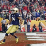 Notre Dame quarterback DeShone Kizer (14) reacts in the end zone after scoring a touchdown against Ohio State during the first half of the Fiesta Bowl NCAA College football game, Friday, Jan. 1, 2016, in Glendale, Ariz.  (AP Photo/Ross D. Franklin)