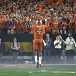 Clemson's Deshaun Watson tries to fire up the crowd before the NCAA college football playoff championship game against Alabama Monday, Jan. 11, 2016, in Glendale, Ariz. (AP Photo/David J. Phillip)