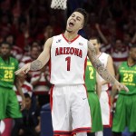 Arizona guard Gabe York (1) reacts after hitting a 3-pointer against Oregon during the first half of an NCAA college basketball game, Thursday, Jan. 28, 2016, in Tucson, Ariz. (AP Photo/Rick Scuteri)