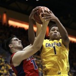 Arizona's Dusan Ristic, left, and California's Ivan Rabb (1) fight for a rebound in the first half of an NCAA college basketball game Saturday, Jan. 23, 2016, in Berkeley, Calif. (AP Photo/Ben Margot)