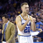 UCLA guard Bryce Alford, right, celebrates as his father head coach Steve Alford stands in the background in the closing seconds of the second half of an NCAA college basketball game against Arizona, Thursday, Jan. 7, 2016, in Los Angeles. UCLA won 87-84. (AP Photo/Mark J. Terrill)