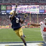Notre Dame wide receiver Chris Brown (2) reaches for a touchdown pass as Ohio State cornerback Gareon Conley (8) defends during the second half of the Fiesta Bowl NCAA College football game, Friday, Jan. 1, 2016, in Glendale, Ariz.  (AP Photo/Rick Scuteri)