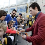 Nashville Predators forward James Neal signs autographs as he arrives for the NHL hockey All-Star game Sunday, Jan. 31, 2016, in Nashville, Tenn. (AP Photo/Mark Zaleski)