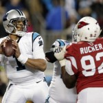 Carolina Panthers' Cam Newton throws during the first half the NFL football NFC Championship game against the Arizona Cardinals Sunday, Jan. 24, 2016, in Charlotte, N.C. (AP Photo/Chuck Burton)