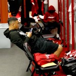 Arizona Cardinals wide receiver Brittan Golden cleans out his locker, Monday, Jan. 25, 2016, in Tempe, Ariz. The Cardinals lost to the Carolina Panthers in the NFC Championship football game to end their season. (AP Photo/Matt York)