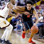 Oregon State's Stephen Thompson Jr. (2) drives past Arizona State's Andre Spight during the first half of an NCAA college basketball game, Thursday, Jan. 28, 2016, in Tempe, Ariz. (AP Photo/Matt York)