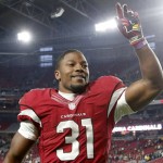 Arizona Cardinals running back David Johnson (31) celebrates after an NFL football game against the Green Bay Packers, Sunday, Dec. 27, 2015, in Glendale, Ariz. The Cardinals won 38-8. (AP Photo/Ross D. Franklin)