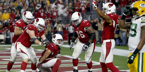 Arizona Cardinals wide receiver Larry Fitzgerald (11) celebrates his game winning touchdown with te...