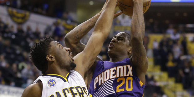 Indiana Pacers forward Solomon Hill (44) blocks the shot of Phoenix Suns guard Archie Goodwin (20) ...