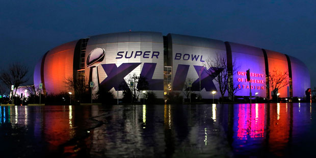 The Super Bowl XLIX is displayed on the University of Phoenix Stadium Thursday, Jan. 29, 2015, in G...
