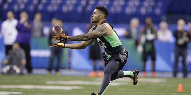 Arizona State receiver D J Foster runs a drill at the NFL football scouting combine on Saturday, Fe...