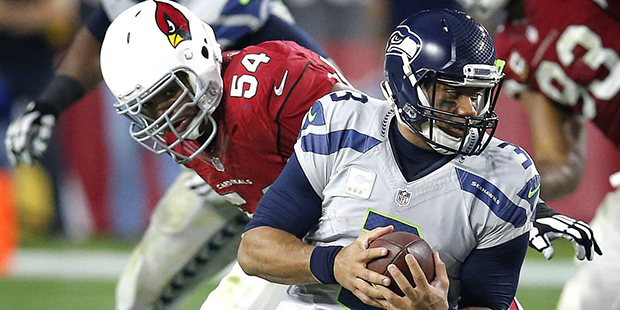 Seattle Seahawks quarterback Russell Wilson (3) is sacked by Arizona Cardinals inside linebacker Dw...