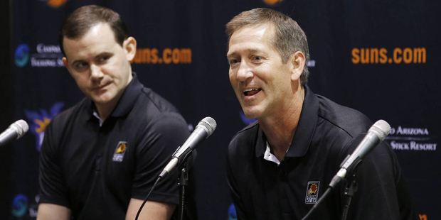 Phoenix Suns head coach Jeff Hornacek, right, answers a questions as general manager Ryan McDonough...