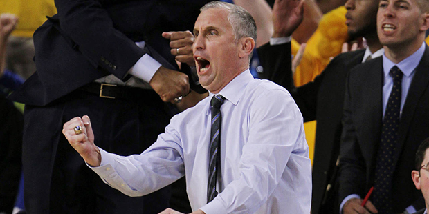 Arizona State coach Bobby Hurley celebrates from the sidelines during the second half of the team's...