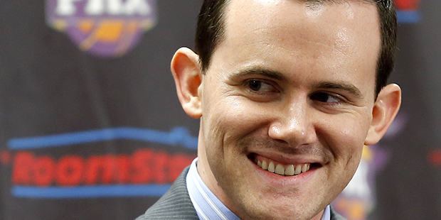 Newly-appointed Phoenix Suns general manager Ryan McDonough smiles during an NBA basketball news co...