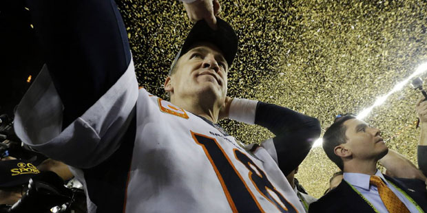Denver Broncos' Peyton Manning (18) walks on the field after their win against the Carolina Panther...