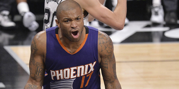 Phoenix Suns forward P.J. Tucker reacts to a call to referee Mark Ayotte during the second half of ...