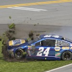 Chase Elliott (24) crashes during the NASCAR Daytona 500 auto race at Daytona International Speedway, Sunday, Feb. 21, 2016, in Daytona Beach, Fla. (AP Photo/Wilfredo Lee)