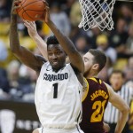 Colorado forward Wesley Gordon, front, pulls in a rebound in front of Arizona State forward Eric Jacobsen in the first half of an NCAA college basketball game Sunday, Feb. 28, 2016, in Boulder, Colo. (AP Photo/David Zalubowski)