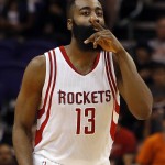 Houston Rockets guard James Harden gestures to the crowd during the third quarter of the team's NBA basketball game against the Phoenix Suns, Friday, Feb. 19, 2016, in Phoenix. The Rockets defeated the Suns 116-100. (AP Photo/Rick Scuteri)