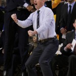 Arizona State coach Bobby Hurley celebrates from the sidelines during the second half of the team's NCAA college basketball game against Southern California in Tempe, Ariz., Friday, Feb. 12, 2016. Arizona State defeated USC 74-67. (AP Photo/Ricardo Arduengo)