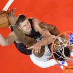 Los Angeles Clippers center DeAndre Jordan, right, blocks a shot by Phoenix Suns center Alex Len, of Ukraine, during the first half of an NBA basketball game, Monday, Feb. 22, 2016, in  Los Angeles. (AP Photo/Mark J. Terrill)