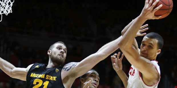 Arizona State forward Eric Jacobsen (21) fights for a rebound with Utah forwards Gabe Bealer (30) a...