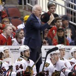 Chicago Blackhawks' Joel Quenneville stands on the team bench as he argues with officials during the first period of an NHL hockey game against the Arizona Coyotes Thursday, Feb. 4, 2016, in Glendale, Ariz. (AP Photo/Ross D. Franklin)