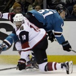 Arizona Coyotes' Anthony Duclair (10) collides with San Jose Sharks' Justin Braun (61) during the second period of an NHL hockey game Saturday, Feb. 13, 2016, in San Jose, Calif. (AP Photo/Marcio Jose Sanchez)