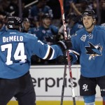 San Jose Sharks' Matt Tennyson, right, celebrates his goal with teammate Dylan DeMelo (74) during the first period of an NHL hockey game against the Arizona Coyotes on Saturday, Feb. 13, 2016, in San Jose, Calif. (AP Photo/Marcio Jose Sanchez)