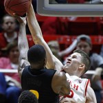 Utah forward Jakob Poeltl (42) blocks the shot of Arizona State forward Willie Atwood (2) during the first half of an NCAA college basketball game in Salt Lake City, Thursday, Feb. 25, 2016. (AP Photo/George Frey)