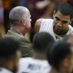 Colorado head coach Tad Boyle, left, hugs forward Josh Scott as he leaves the floor against Arizona State late in the second half of an NCAA college basketball game, Sunday, Feb. 28, 2016, in Boulder, Colo. Colorado won 79-69. Scott, a senior, was playing in his final home game. (AP Photo/David Zalubowski)