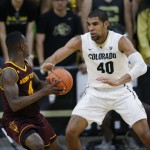 Colorado forward Josh Scott, right, defends against Arizona State guard Gerry Blakes as he looks to pass the ball in the second half of an NCAA college basketball game, Sunday, Feb. 28, 2016, in Boulder, Colo. Colorado won 79-69. (AP Photo/David Zalubowski)