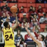 Arizona State's Andre Spight (24) shoots against Washington State's Brett Boese (33) during the first half of an NCAA college basketball game, Saturday, Feb. 6, 2016, in Pullman, Wash. (AP Photo/Young Kwak)