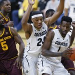 Colorado forward Wesley Gordon, right, pulls in a rebound in front of guard George King, center, and Arizona State forward Obinna Oleka in the second half of an NCAA college basketball game Sunday, Feb. 28, 2016, in Boulder, Colo. (AP Photo/David Zalubowski)