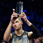 United States' Zach LaVine holds the MVP trophy after the NBA Rising Stars Challenge basketball game in Toronto on Friday, Feb. 12, 2016. (Mark Blinch/The Canadian Press via AP)